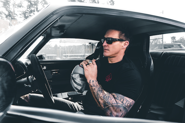 ADF military male with tattoos sitting inside a car wearing Gatorz Delta sunglasses